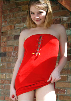 Young Danielle in a sexy red dress